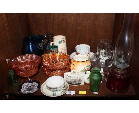 SECTION 34.  Various ceramic and glass items including crested china, a cranberry oil lamp, carnival glass, a moustache cup a