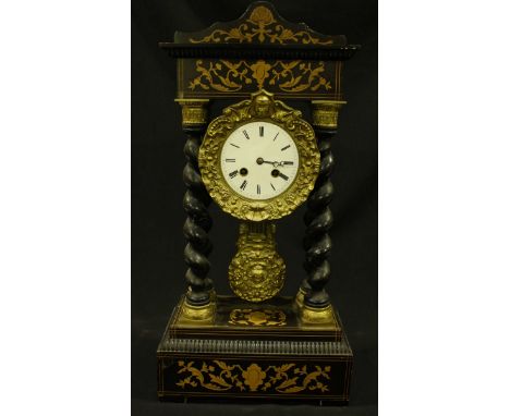 A Victorian ebonised marquetry mantel clock with ormolu mounts, the white enamel dial with black Roman numerals, the movement