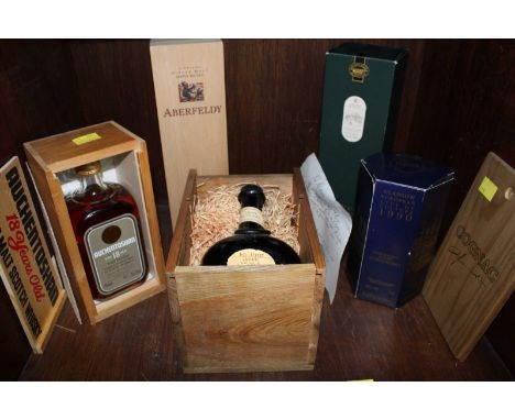 A bottle of Lagavulin 16 year old Single Islay Malt Whisky, in original box, together with a bottle of Auchentoshan 18 year o