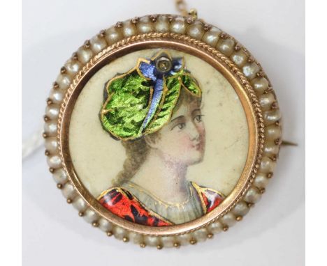 A 9ct gold, seed pearl and enamel circular portrait brooch, the central concave panel painted with a girl wearing a head dres