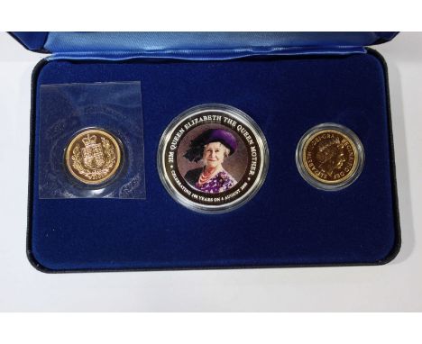 A boxed set "HM Queen Mother," celebrating 100 years, comprising two full sovereigns and a silver One Dollar with enamel port