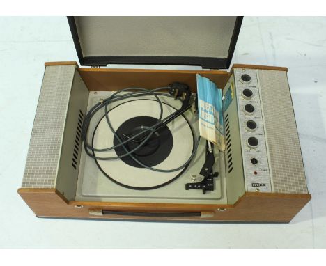 An ITT KB model turntable record player.