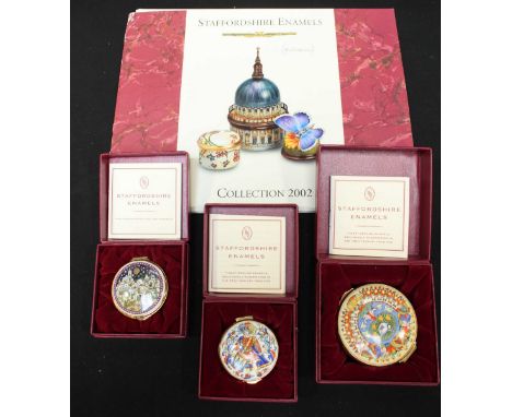 A group of thee Staffordshire enamel Christmas boxes, together with booklet. (4)