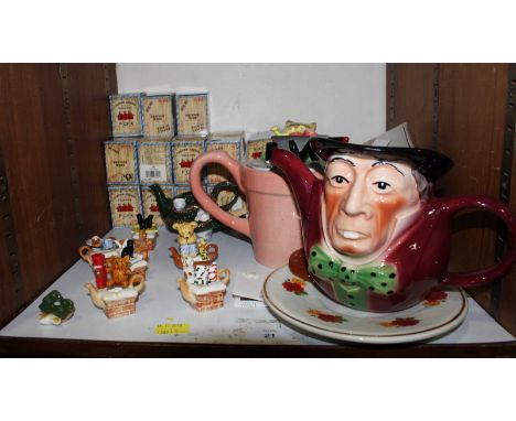 SECTION 21.  An assortment of various collectable ceramic teapots including a number of boxed, miniature teapots and two larg