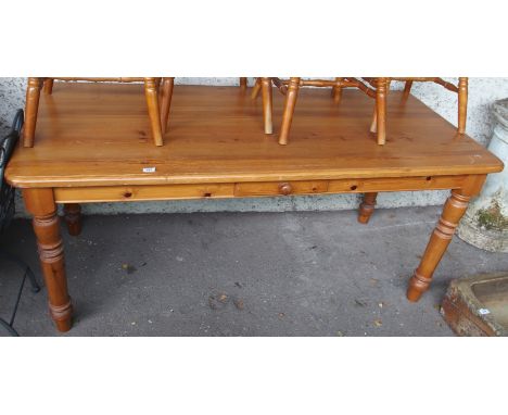 A large pine kitchen table with single drawer, 77cm high x 180cm wide x 77cm deep Condition Report: Available upon request