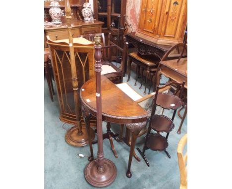 Two standard lamps, demi lune table, stool, firescreen, cake stand and a corner cabinet (7) Condition Report: Available upon 