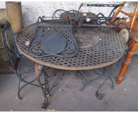 A circular metal garden table and chairs and a garden bench (af) Condition Report: Available upon request