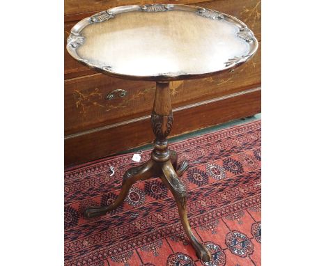 A mahogany tilt top occasional table on tripod base, 52cm diameter Condition Report: Available upon request