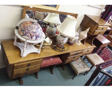 An oak dressing table with mirror,128cm high x 162cm wide, matching dressing stool and a pair of two drawer bedside cabinets 