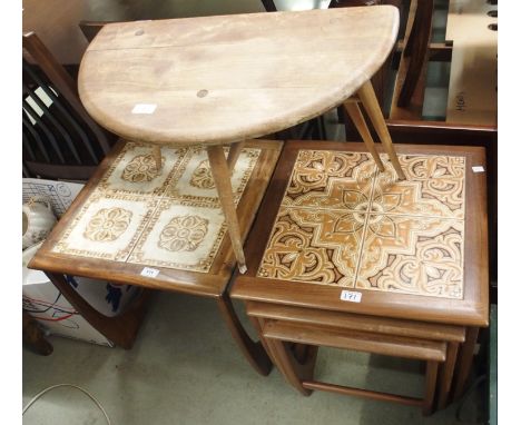 An Ercol side table with drop leaf, a nest of tables with tile top and a tile top side table (3) Condition Report: Available 