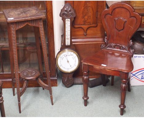 A mahogany hall chair, a carved plant stand and an oak barometer (3) Condition Report: Available upon request
