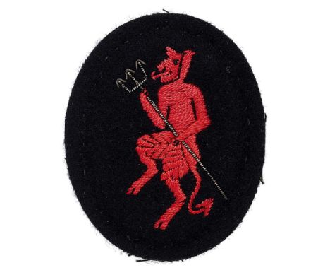 Inns of Court Regiment Officer beret badge WW2 period.  Large padded black cloth oval bearing red silk Devil holding a triden