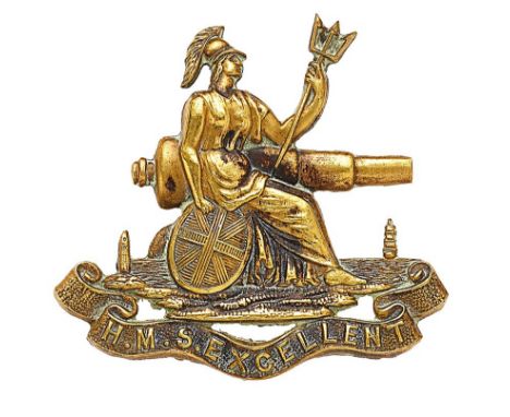 Royal Navy HMS Excellent Victorian cap badge.  Good scarce die-stamped brass Britannia with trident and Union shield; naval g