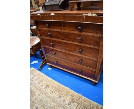 A Victorian mahogany Scotch style chest of one secret over two over four drawers , on bun feet