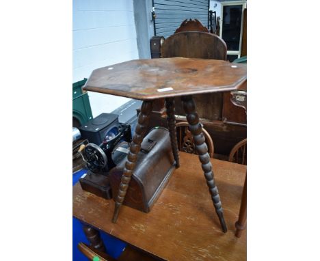 A 19th Century occasional table having walnut octagonal top , on triple bobbin turned splay legs in the Gypsy style
Minimal w