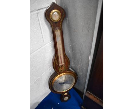 A Victorian rosewood cased onion top barometer having hygrometer, thermometer and level, with griffin decoration