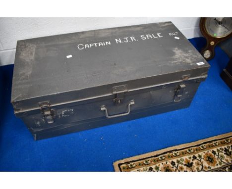 A vintage metal travel trunk, bears name for Captain NJR Sale, RGJ
