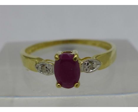 A 9ct gold, ruby and diamond ring, weight 0.9g, size O