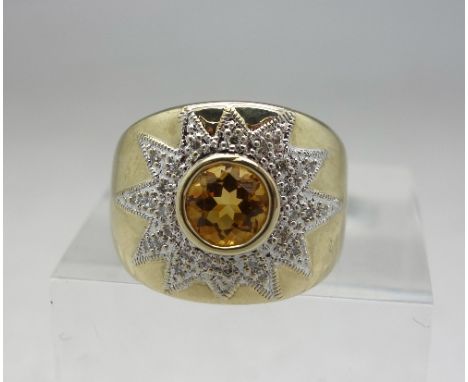 A 9ct gold, citrine and diamond cluster ring, weight 4.3g, size K