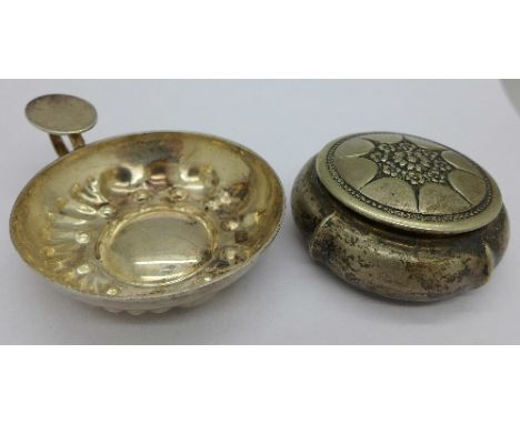 A white metal patch box and dish