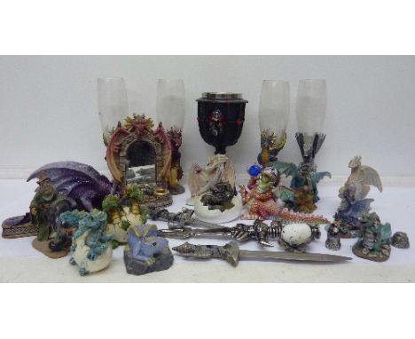 A collection of Myth and Magic figures, a goblet and glasses