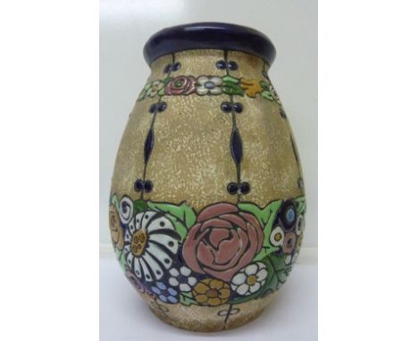 An Austrian Amphora vase with raised enamel floral design, early 20th Century, height 27cm