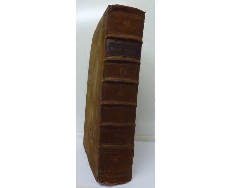 A large leather-bound bible, printed and published by R. Dowson, Nottingham 1811, with commentary and engravings