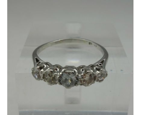 A circa. 1920's platinum set five stone diamond ring, approximately 1 carat diamond weight, weight 4g, size R