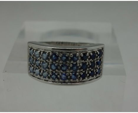 A 9ct white gold, sapphire cluster ring, weight 3.1g, size K