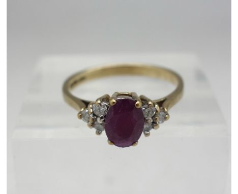 A 9ct gold, ruby and diamond ring, weight 2g, size N