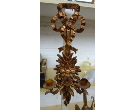 A pair of Louis XVI style two branch wall appliques, 62cm, a pair of Victorian style brass half block doorstops, a handbell a