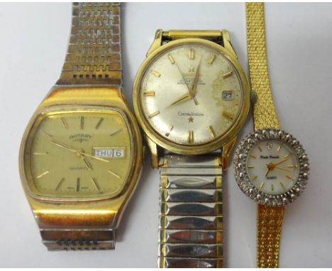 A gentleman's gilt metal fronted and steel backed Omega Automatic Constellation wristwatch, the signed circular silvered dial