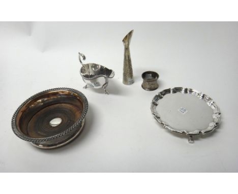 An Eastern vase, of tapering form, on a weighted base, detailed Sterling Silver, probably Indian, cased, a silver napkin ring