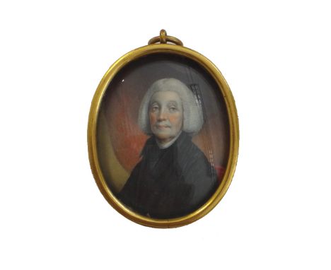 Mid 18th century, English School, portrait miniature on ivory of the Reverend Henry Leslie DD (1719-1803), red curtain in the