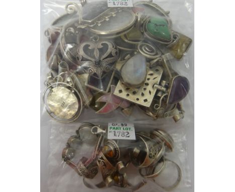 Mostly silver and gem set jewellery, comprising; thirty pendants, a bracelet and ten rings in a variety of designs.