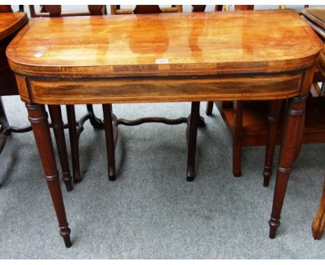 A later George III rosewood card table on tapering square supports, 91cm wide. 