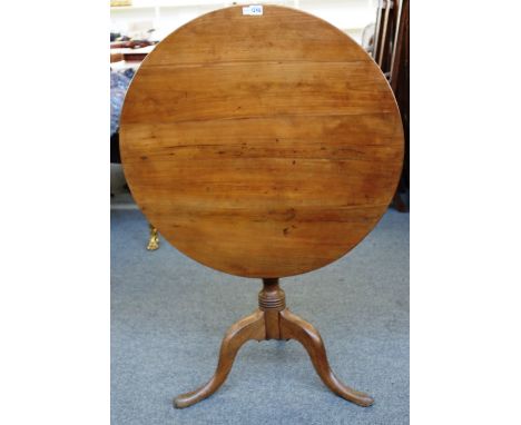 A George III snap top tripod occasional table with cherry wood top, 78cm wide.  