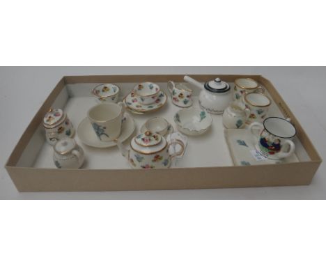 A group of Minton bone china miniature teawares, circa 1900, painted with scattered flowers, comprising; a teapot and cover, 