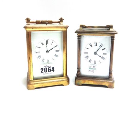 A gilt brass cased carriage clock, early 20th century, with white enamel dial, push repeat and two train movement, 12cm high,