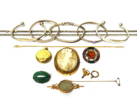 A gold mounted oval shell cameo brooch, carved as the portrait of a lady, the mount detailed 9 CT, four bangles, three brooch