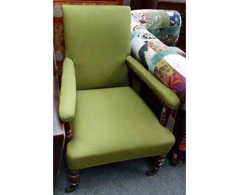 An early 19th century faux rosewood open armchair on turned supports.