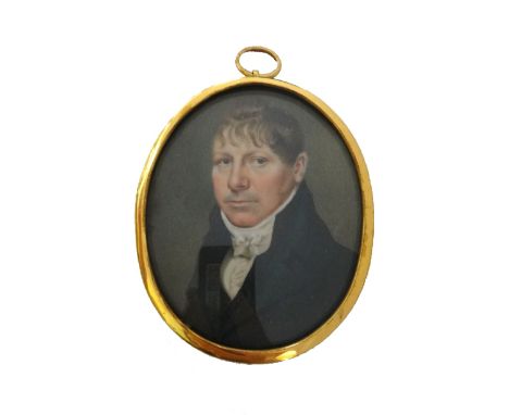 Early 19th century, English School, portrait miniature on ivory of a man wearing a dark grey black coat and tied white stock,