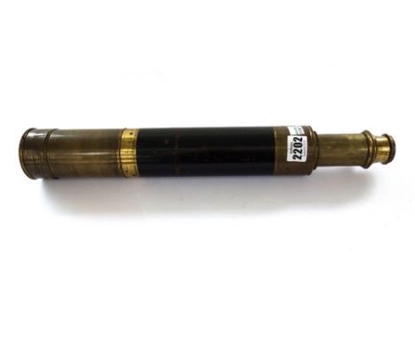 A brass and wooden bound two draw telescope, late 19th century, 90.5cm fully extended.