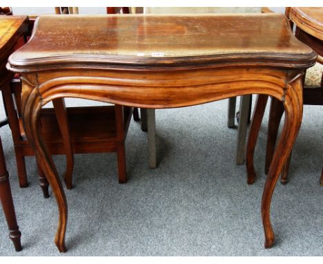 A 19th century French rosewood card table, the serpentine top on cabriole supports, 87cm wide. 