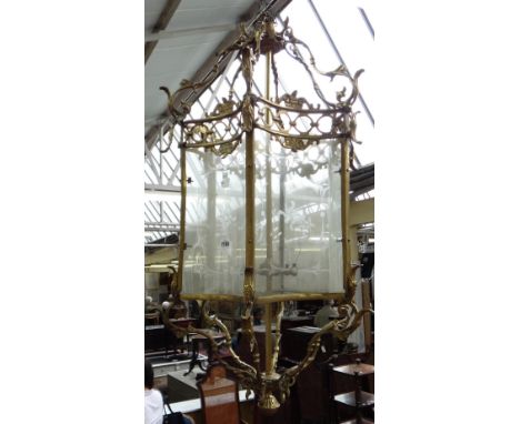 A pair of Edwardian style gilt lanterns, 20th century, with an open six branch scroll frame united by six concave etched glas