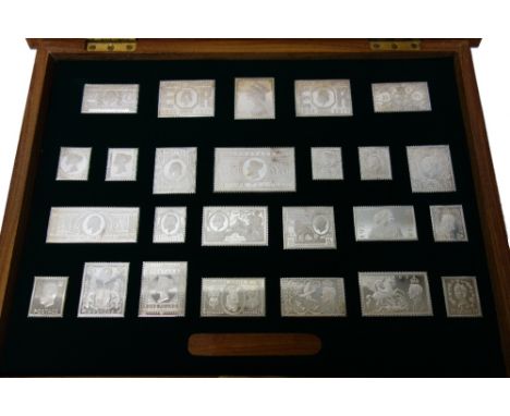 A set of twenty-five silver replica postage stamp ingots, with card detailed 'The Stamps of Royalty' and certificate, with th