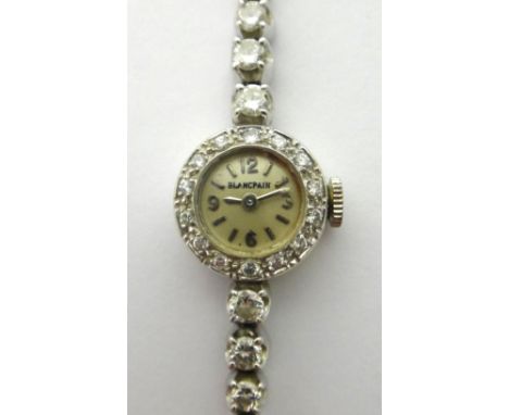 A lady's white gold and diamond set Blancpain bracelet wristwatch, the signed circular silvered dial with Arabic and baton sh
