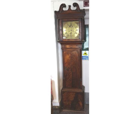 A mahogany cased longcase clock,19th century, with broken arched pediment over a brass moonphase dial detailed 'Wm Lanson New