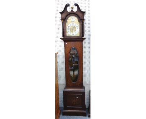 An early 20th century eight day mahogany inlaid longcase clock, bevelled glazed door, 10 1/4 inch arched brass dial supportin