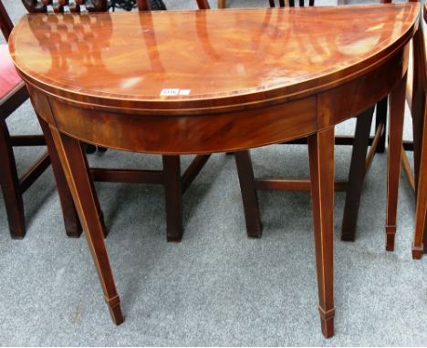 A George III inlaid mahogany card table on tapering square supports, 96cm wide. 